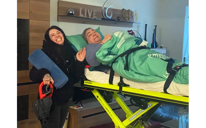 Mother on stretcher visits new home of daughter for the first and last time